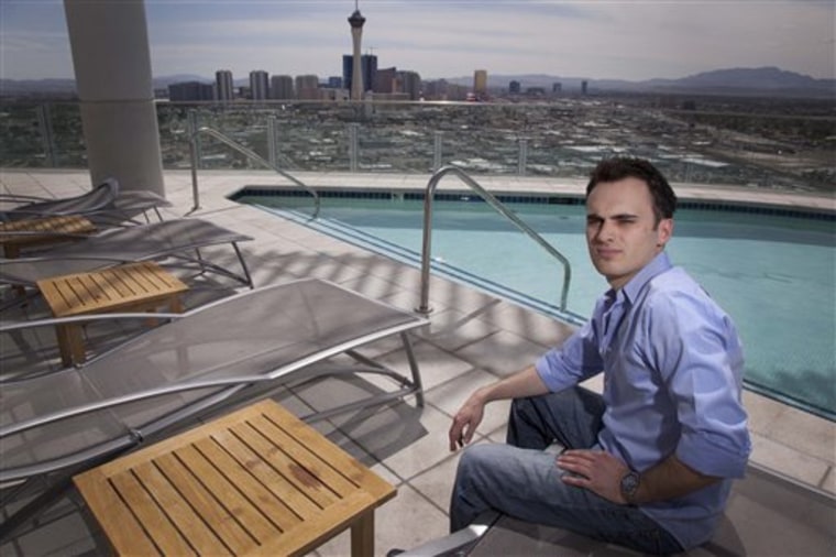 Professional online poker player Robert Fellner — seen on the roof of his apartment in Las Vegas —  has a bankroll of $280,000, but he and others like him worry they'll never see their money again.